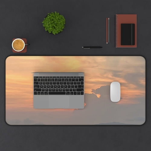 Golden Horizon Desk Mat displaying a laptop, mouse, and office supplies on a stylish, vibrant surface.