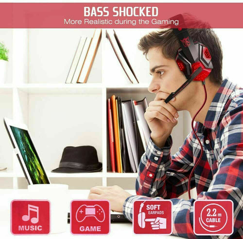 3.5mm Gaming Headset Mic LED Headphones Stereo Bass Surround For PC used by a gamer immersed in gameplay.