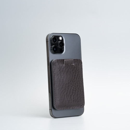 Leather Wallet compatible with MagSafe - 6 cards attached to a smartphone for stylish card storage.